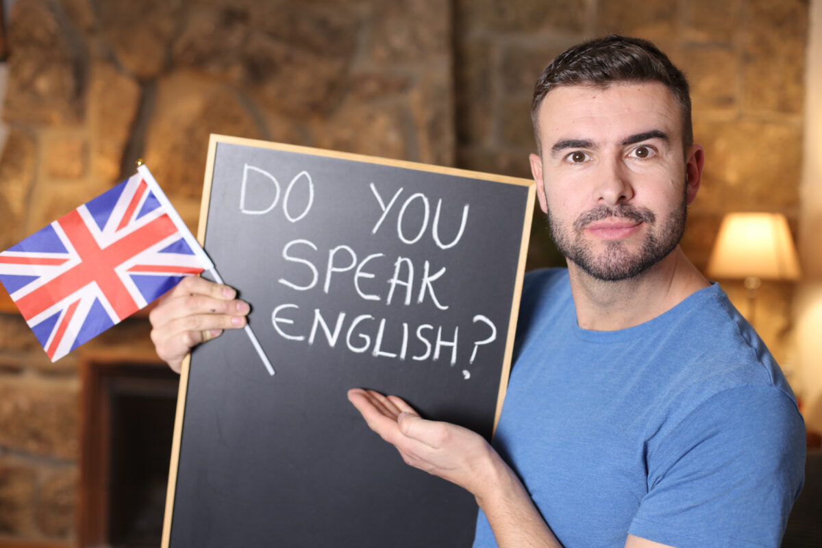 english,teacher,holding,british,flag